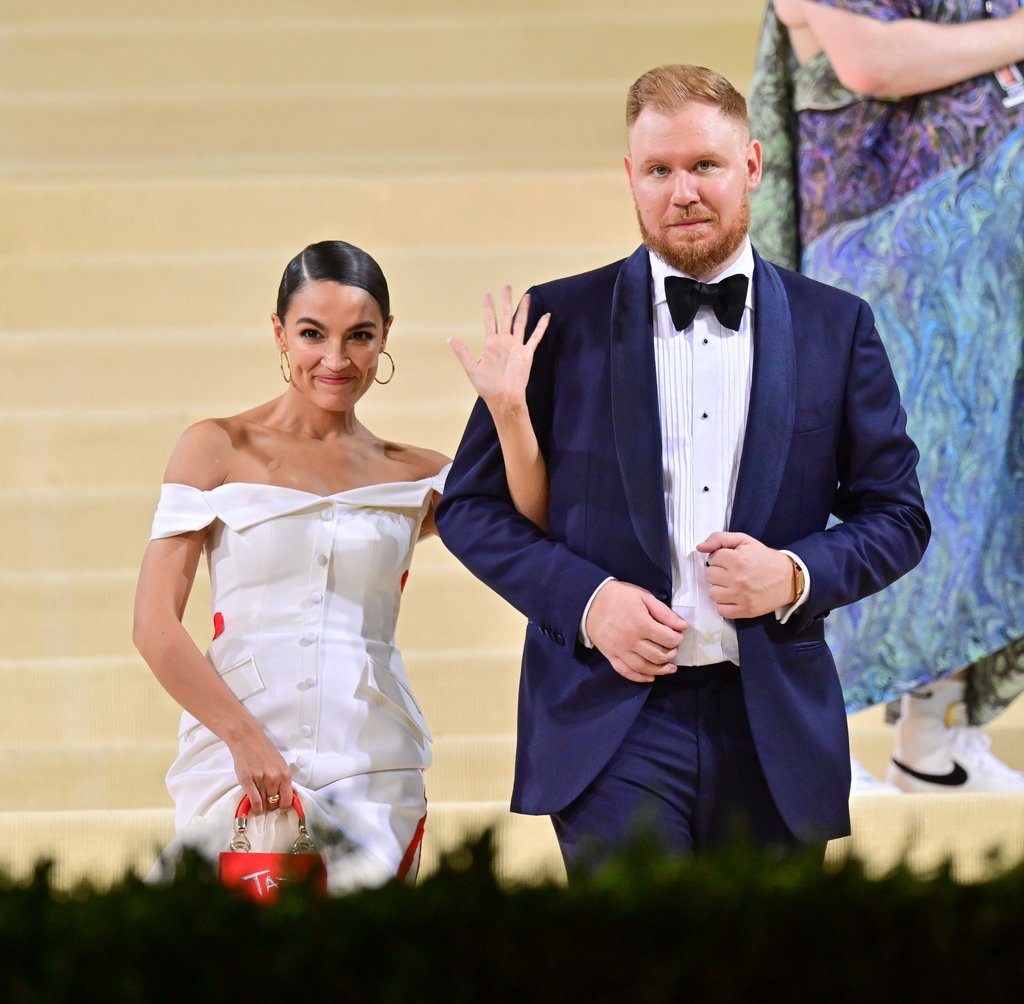 Alexandria Ocasio-Cortez and her partner Riley Roberts leaving the 2021 Met Gala. Photo: Getty Images