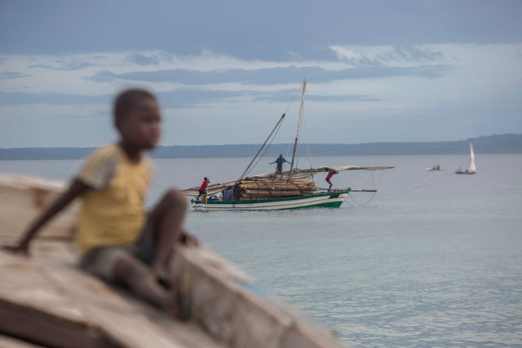Boats operate off the coast of Paquitequete, on the opposite side of the Mozambique Channel from Madagascar. Piracy, trafficking and illegal fishing have become issues in the waterway in recent years. Photo: AFP Boats operate off the coast of Paquitequete, on the opposite side of the Mozambique Channel from Madagascar. Piracy, trafficking and illegal fishing have become issues in the waterway in recent years. Photo: AFP
