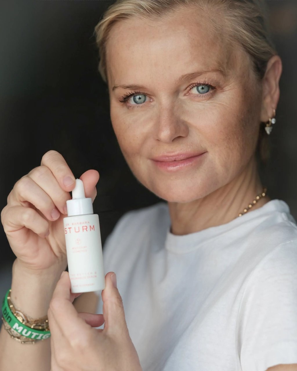 Dr Barbara Sturm with one of her products Dr Barbara Sturm with one of her products