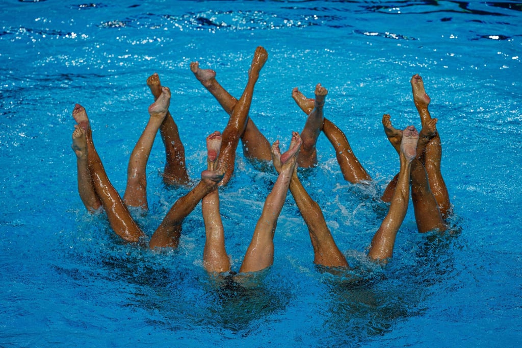 Until this year, artistic swimming was a women-only sport. Photo: AFP