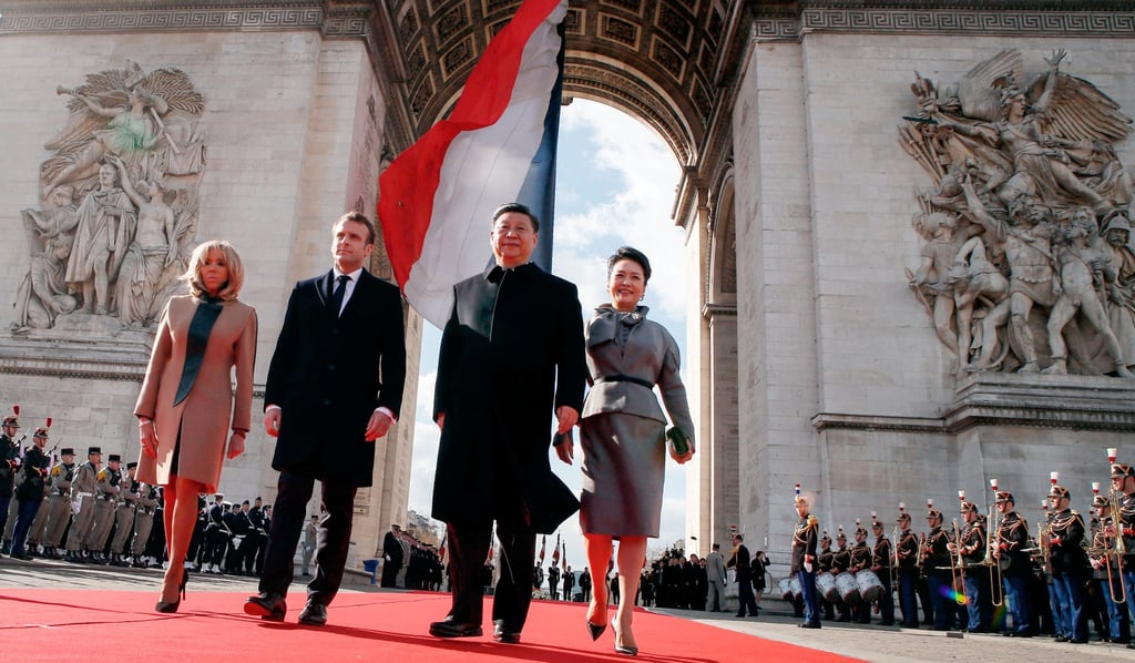 French President Emmanuel Macron (second from left), his wife Brigitte Macron, Chinese President Xi Jinping (second from right) and his wife Peng Liyuan attend a ceremony at the Arc de Triomphe in Paris in March 2019. Photo: AFP French President Emmanuel Macron (second from left), his wife Brigitte Macron, Chinese President Xi Jinping (second from right) and his wife Peng Liyuan attend a ceremony at the Arc de Triomphe in Paris in March 2019. Photo: AFP