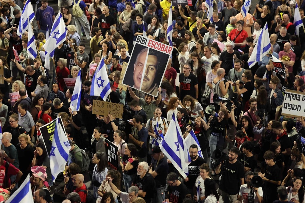 Relatives and supporters of hostages taken captive by Palestinian militants in Gaza hold a demonstration in Tel Aviv on Saturday. Photo: AFP