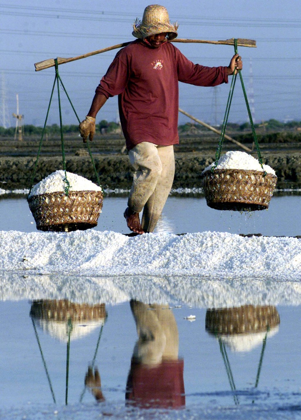 The tradition of salt farming has been handed down for generations, but it is now a dying art. Photo: Reuters The tradition of salt farming has been handed down for generations, but it is now a dying art. Photo: Reuters
