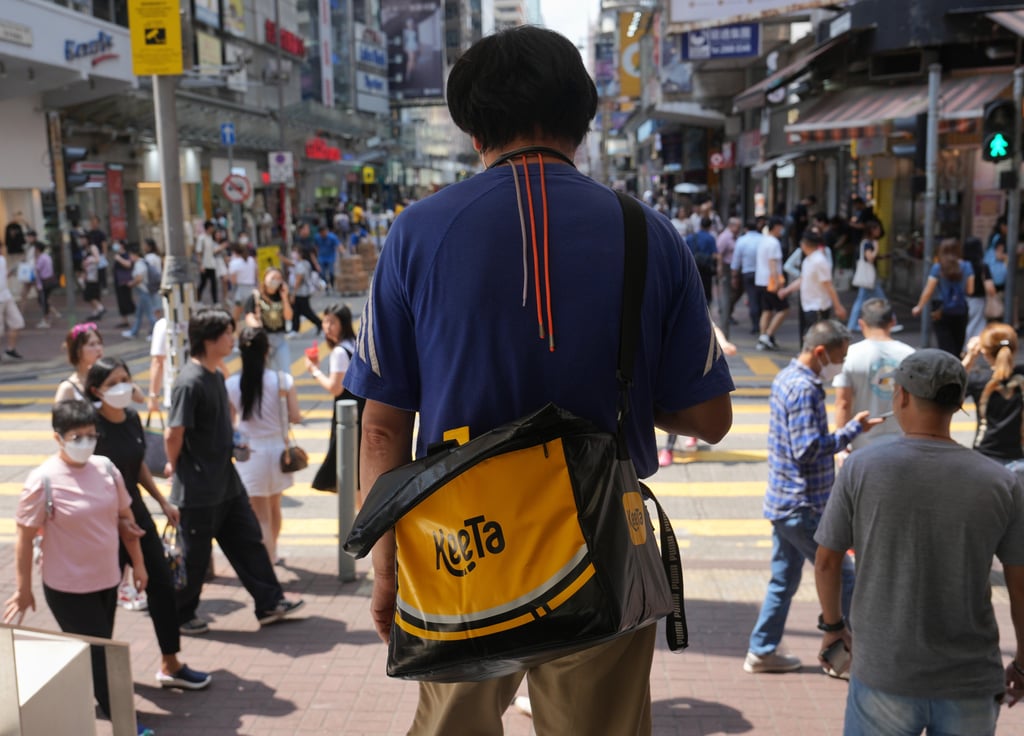 A KeeTa delivery rider promotes the Meituan-owned food delivery platform in the streets of Mong Kok during the app’s local launch on May 22, 2023. Photo: SCMP