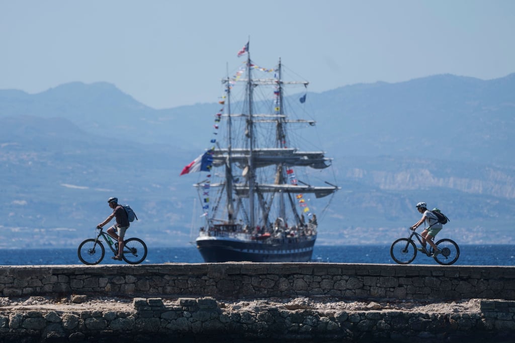 The Belem, the three-masted ship carrying the Olympic flame to France, sailing near Corinth, Greece on April 28. Photo: AP The Belem, the three-masted ship carrying the Olympic flame to France, sailing near Corinth, Greece on April 28. Photo: AP