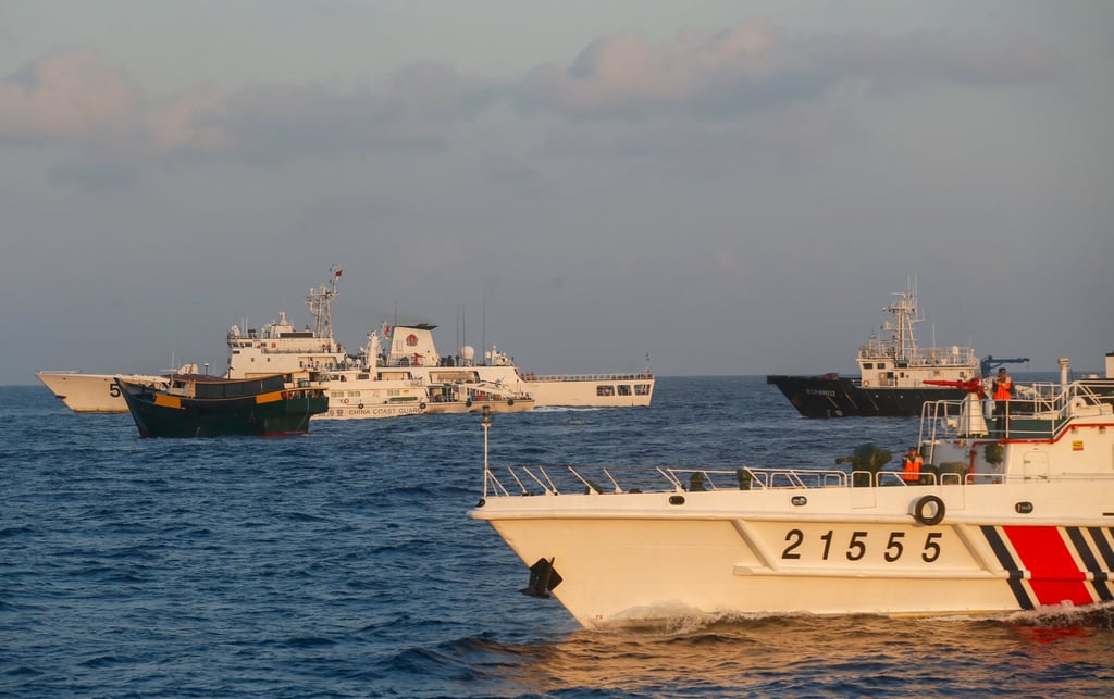 Chinese coastguard vessels try to block a civilian ship chartered by the Philippine Navy for a resupply mission to the Second Thomas Shoal on March 23. Photo: Jeoffrey Maitem
