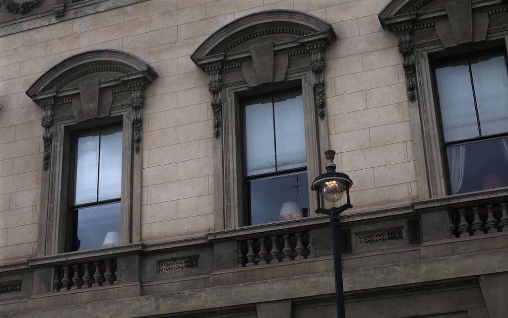 A street lamp illuminates the windows to the Garrick Club, a private member’s club in London. Photo: Reuters A street lamp illuminates the windows to the Garrick Club, a private member’s club in London. Photo: Reuters