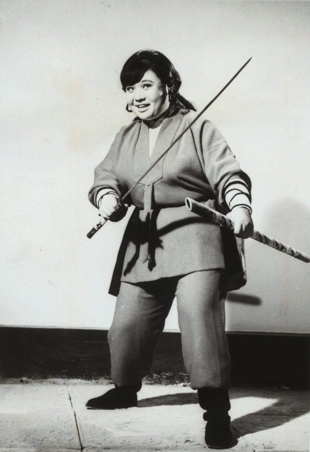 Lydia Sum in a still from The Invincible Eight (1971).