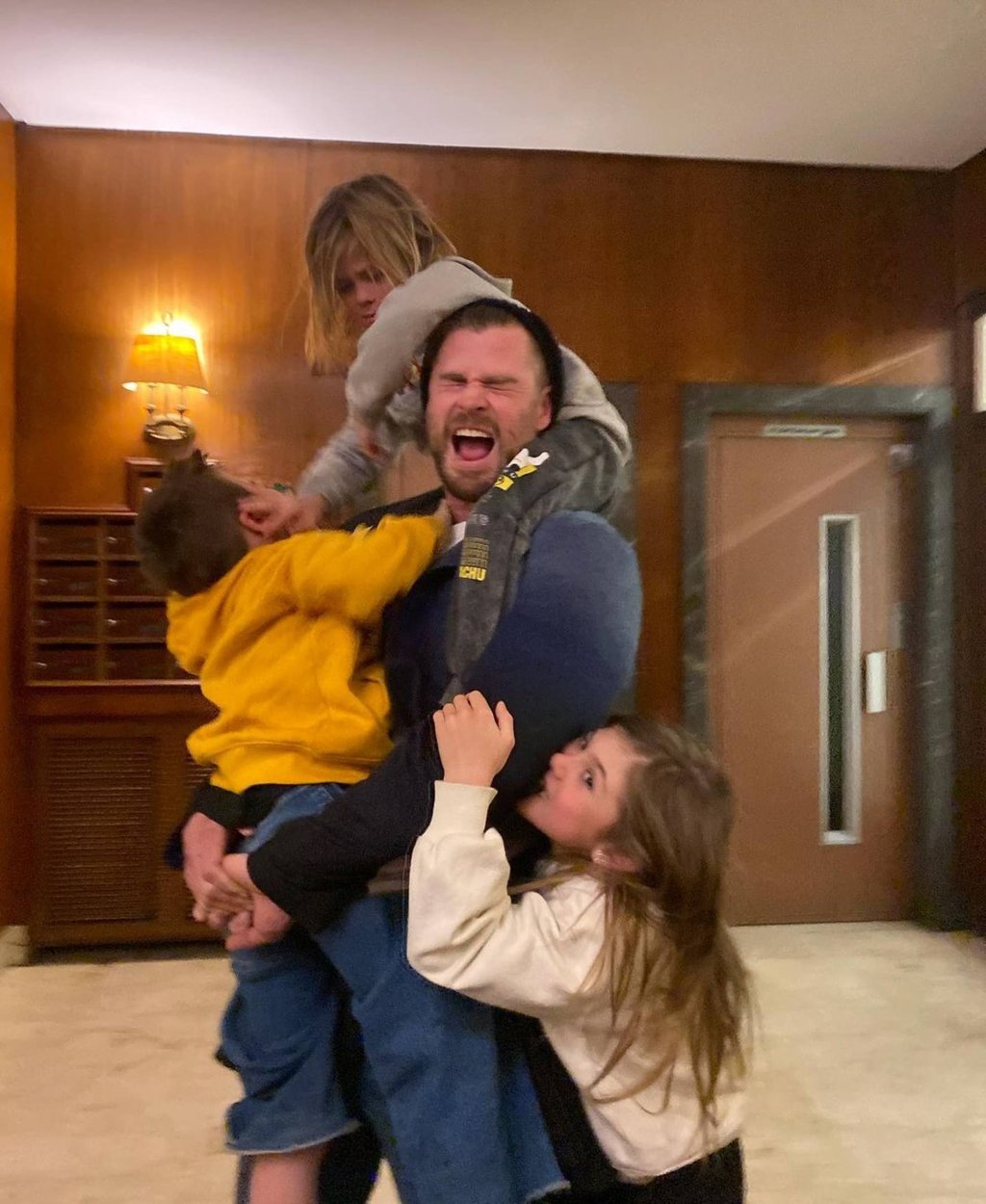 Chris Hemsworth messing around with his three kids. Photo: @elsapataky/Instagram Chris Hemsworth messing around with his three kids. Photo: @elsapataky/Instagram