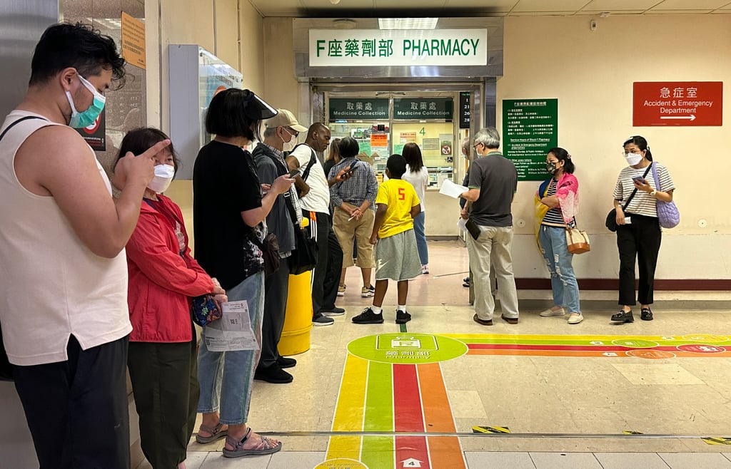 Patients line up to get medicine at the Pharmacy Department of Queen Elizabeth Hospital. Photo: Jelly Tse Patients line up to get medicine at the Pharmacy Department of Queen Elizabeth Hospital. Photo: Jelly Tse