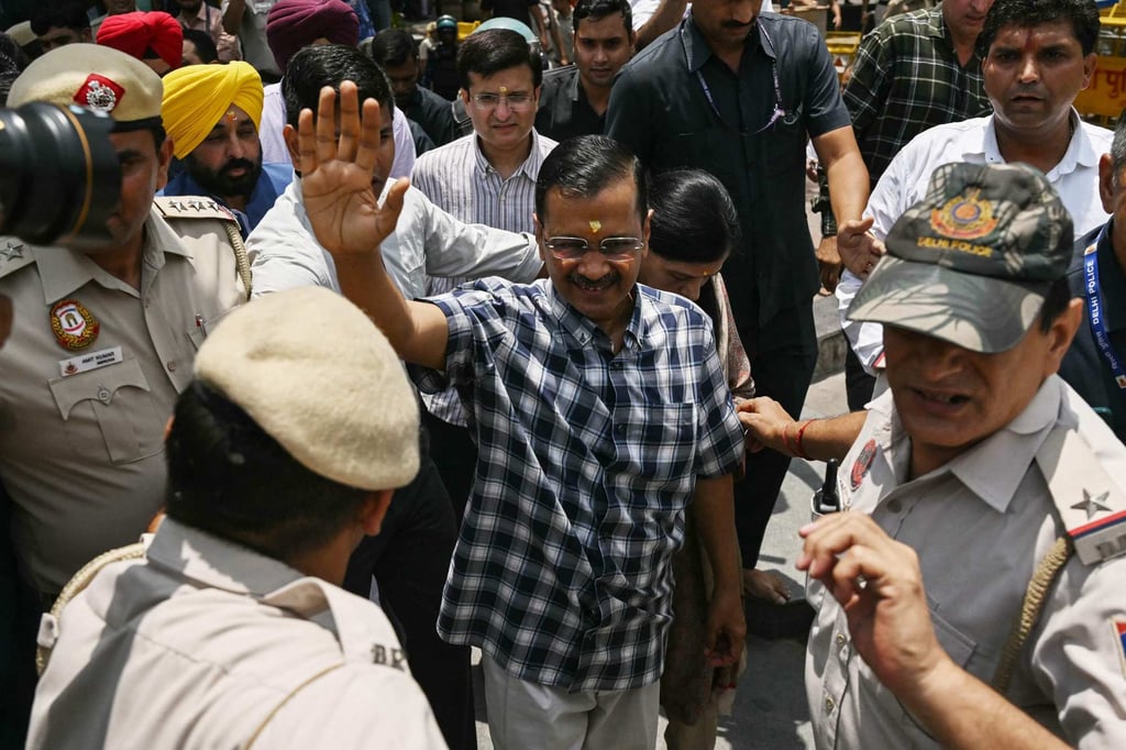 Arvind Kejriwal (centre), chief minister of the capital Delhi and leader of the Aam Aadmi Party, waves to supporters during a visit at a Hindu temple in New Delhi on Saturday, a day after his release on bail. Photo: AFP Arvind Kejriwal (centre), chief minister of the capital Delhi and leader of the Aam Aadmi Party, waves to supporters during a visit at a Hindu temple in New Delhi on Saturday, a day after his release on bail. Photo: AFP