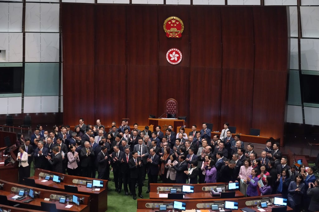Chief Executive John Lee Ka-chiu poses, legislators and government officials mark the passage of the city’s domestic national security law in March. Photo: Sam Tsang Chief Executive John Lee Ka-chiu poses, legislators and government officials mark the passage of the city’s domestic national security law in March. Photo: Sam Tsang