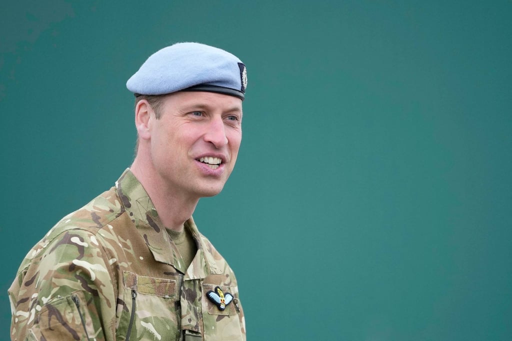 Britain’s Prince William, Prince of Wales speaks to service personal at the Army Aviation Centre in Middle Wallop, England on Monday. Photo: Pool/AFP Britain’s Prince William, Prince of Wales speaks to service personal at the Army Aviation Centre in Middle Wallop, England on Monday. Photo: Pool/AFP