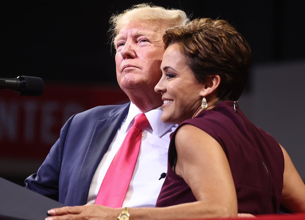 Former US president Donald Trump (left) embraces Republican candidate for governor Kari Lake at a “Save America” rally in support of Arizona Republican candidates on July 22, 2022, in Prescott Valley, Arizona. Photo: Getty Images Former US president Donald Trump (left) embraces Republican candidate for governor Kari Lake at a “Save America” rally in support of Arizona Republican candidates on July 22, 2022, in Prescott Valley, Arizona. Photo: Getty Images
