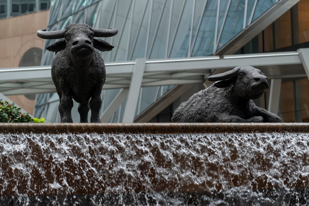 Bronze sculptures of bulls, the symbol of the Hong Kong stock exchange, at the Exchange Square in Central. Photo: Warton Li