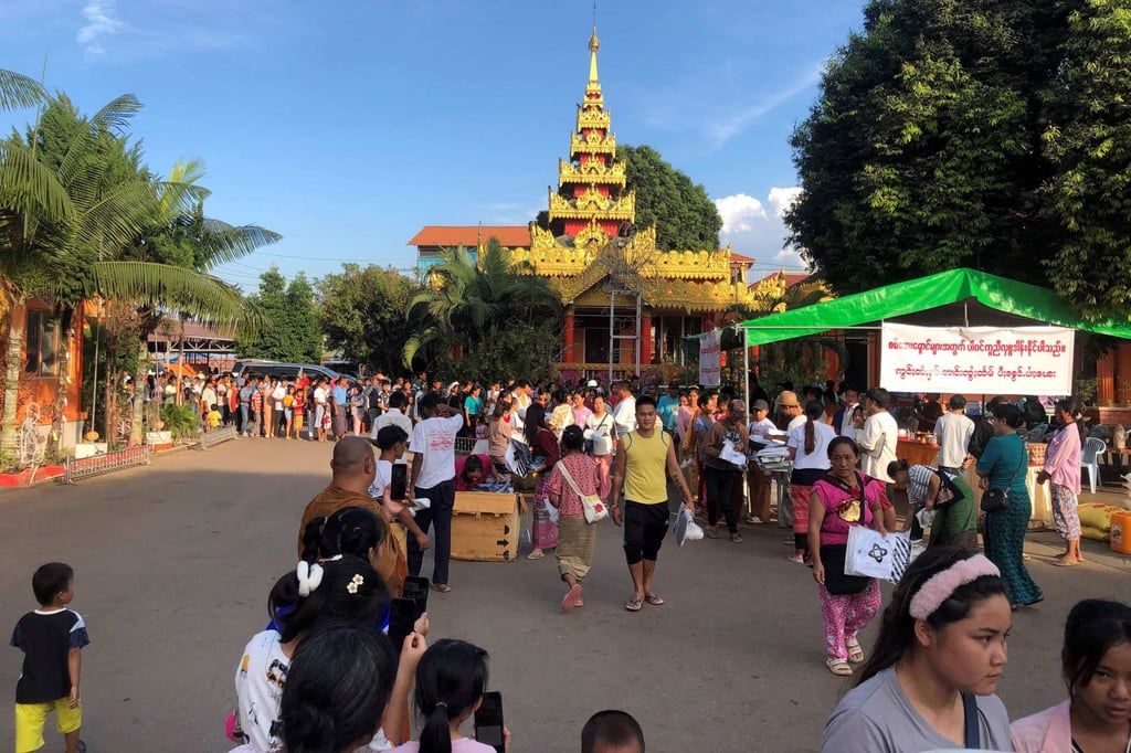 People queue for food at a monastery-turned-temporary shelter for internally displaced people in Myanmar’s Shan state late last year. Photo: AFP