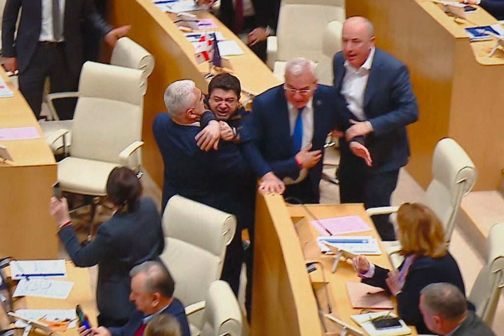 Georgian lawmakers fight during a parliament session in Tbilisi, Georgia. Photo: Mtavari Channel via AP Georgian lawmakers fight during a parliament session in Tbilisi, Georgia. Photo: Mtavari Channel via AP
