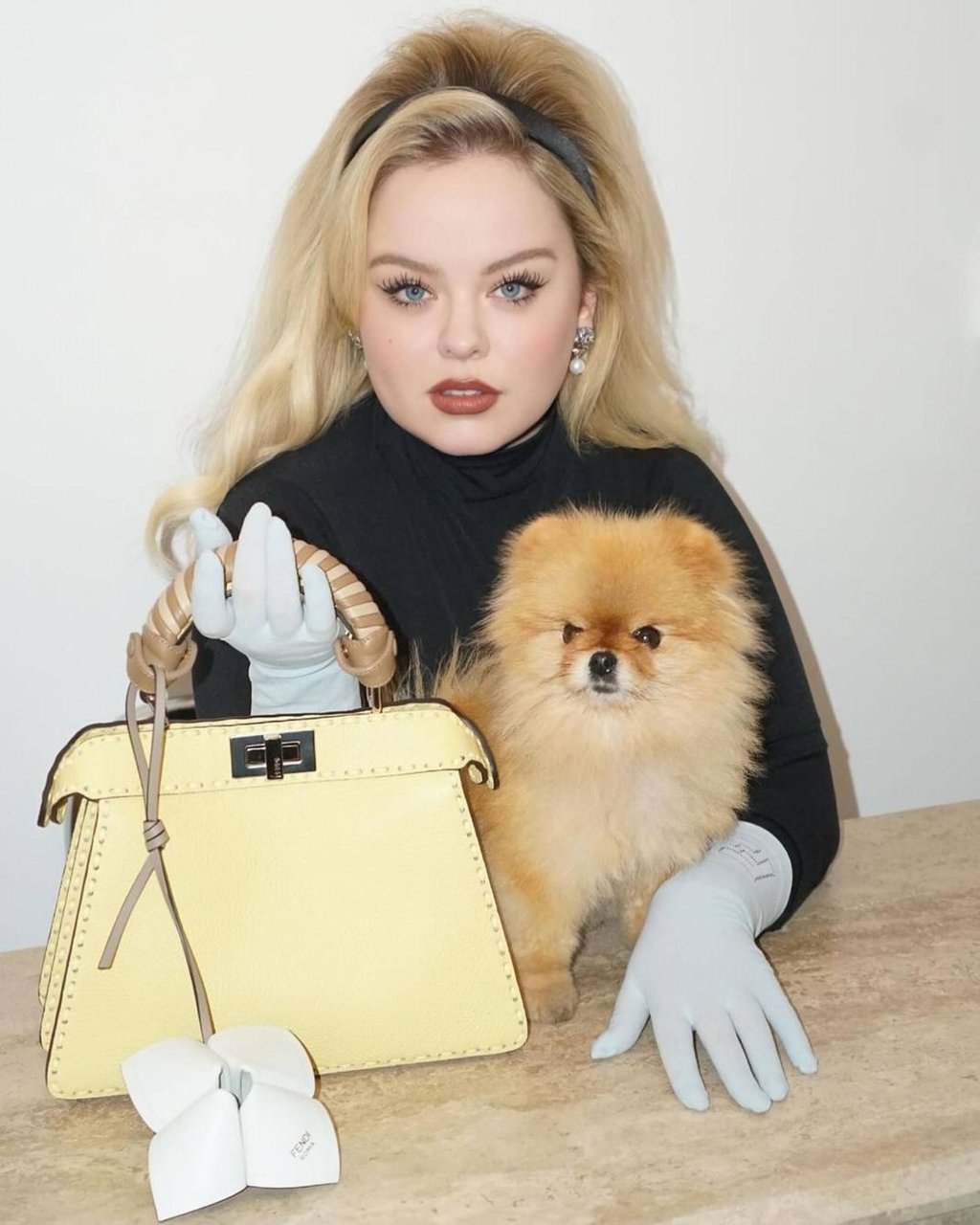 Bridgerton’s Nicola Coughlan poses with a Fendi Peekaboo bag and a dog in April. Photo: @nicolacoughlan/Instagram Bridgerton’s Nicola Coughlan poses with a Fendi Peekaboo bag and a dog in April. Photo: @nicolacoughlan/Instagram