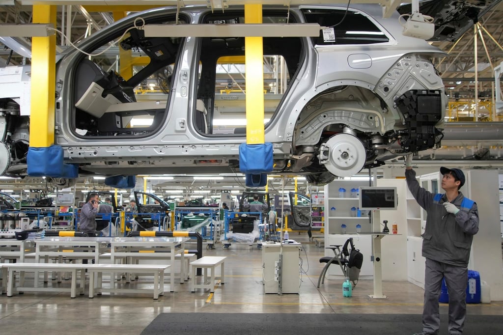 A worker assembles an SUV at a car plant of Li Auto, a major Chinese EV maker, in Changzhou in eastern China’s Jiangsu province on March 27, 2024. The Biden administration has announced plans to slap new tariffs on Chinese electric vehicles, advanced batteries, solar cells, steel, aluminium and medical equipment. Photo: AP
