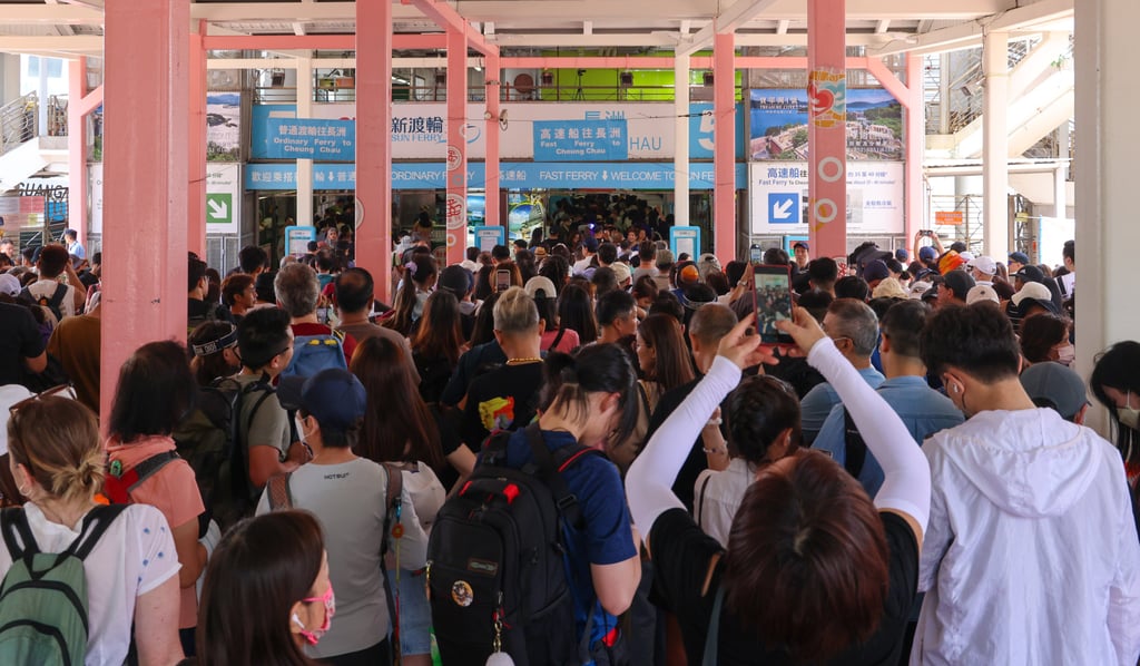 Tourists queue up in Central for the ferry to Cheung Chau. Photo: Jelly Tse