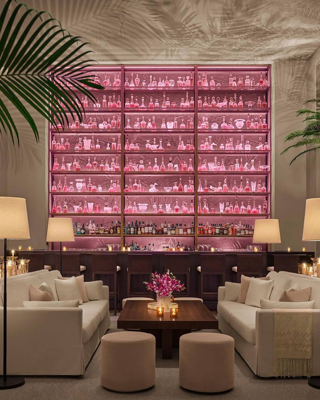 The Lobby Bar’s libation offerings, lit up in pink. Photo: @singaporeedition/Instagram