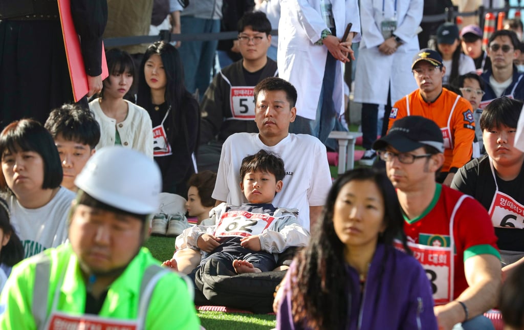The Space-Out Competition in Seoul, South Korea, involved sitting still and staying quiet for 90 minutes. Photo: Xinhua The Space-Out Competition in Seoul, South Korea, involved sitting still and staying quiet for 90 minutes. Photo: Xinhua