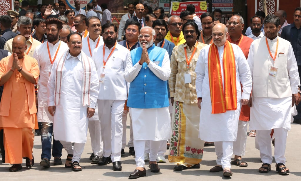 Modi (centre) walks with Home Affairs Minister Amit Shah (second from right) and other leaders from the BJP and its National Democratic Alliance government in Varanasi on Tuesday. Photo: EPA-EFE Modi (centre) walks with Home Affairs Minister Amit Shah (second from right) and other leaders from the BJP and its National Democratic Alliance government in Varanasi on Tuesday. Photo: EPA-EFE