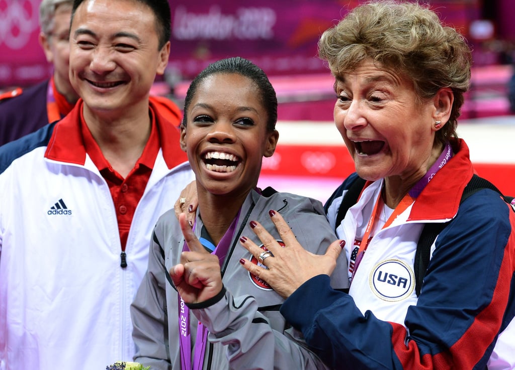 Gabby Douglas celebrates with coaches Liang Chow (left) and Martha Karolyi after winning gold in the women’s individual all-around gymnastics competition during the 2012 Summer Olympic Games. Photo: MCT
