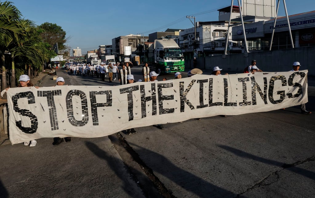 Supporters and relatives of the victims of former Philippine leader Rodrigo Duterte’s war on drugs hold a rally in Metro Manila on May 1. Photo: EPA-EFE