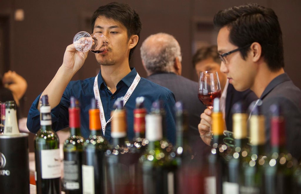 Chinese buyers of fine wine attend the Vinexpo Asia, in Hong Kong, in 2016. Photo: EPA Chinese buyers of fine wine attend the Vinexpo Asia, in Hong Kong, in 2016. Photo: EPA