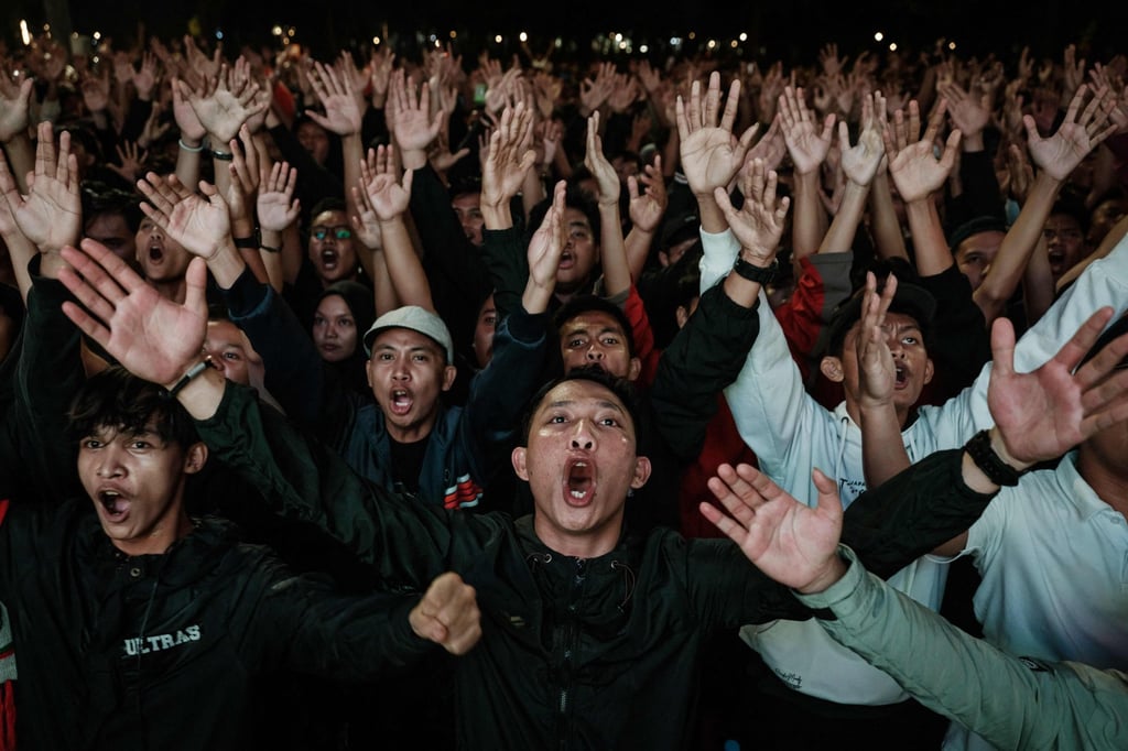 Indonesian fans at a large-screen live streaming of the 1-0 pre-Olympic play-off defeat to Guinea. Photo: AFP