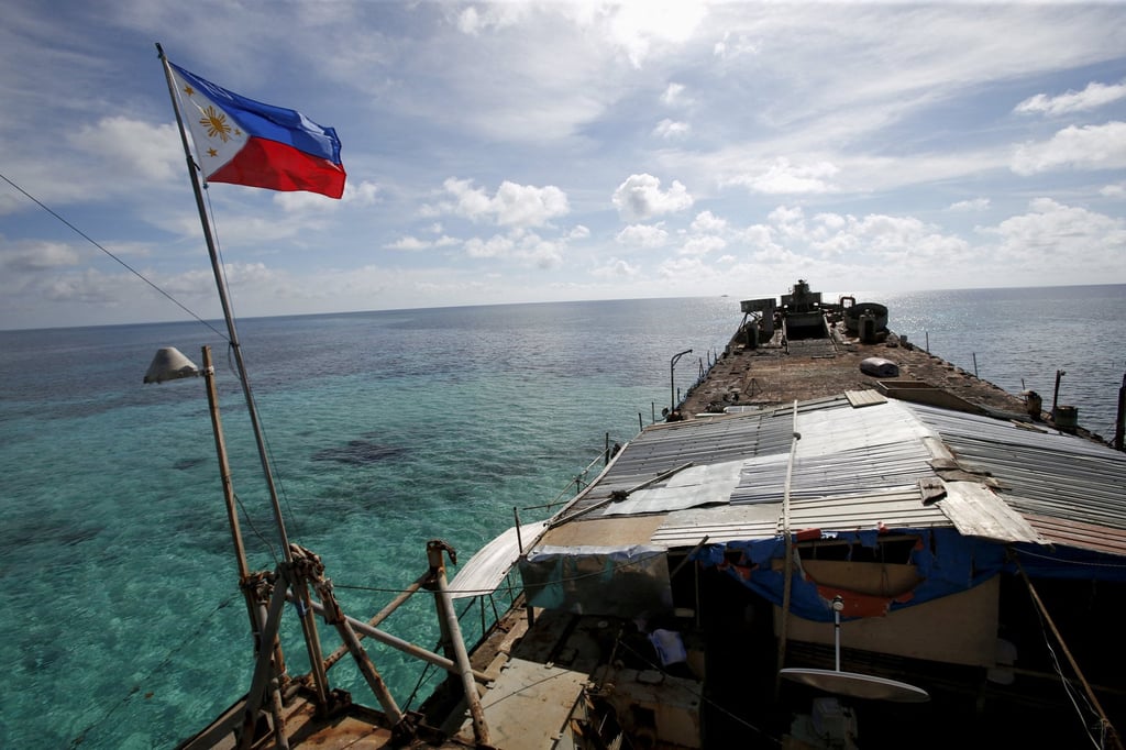 A Philippine flag flutters from BRP Sierra Madre, a Philippine military detachment on the disputed Second Thomas Shoal in the South China Sea. Photo: Reuters A Philippine flag flutters from BRP Sierra Madre, a Philippine military detachment on the disputed Second Thomas Shoal in the South China Sea. Photo: Reuters