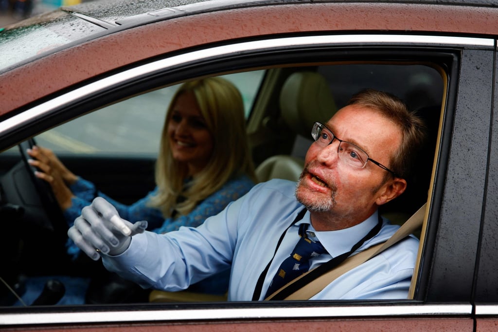 MP Craig Mackinlay arrives at Westminster Palace on Wednesday. Photo: AFP