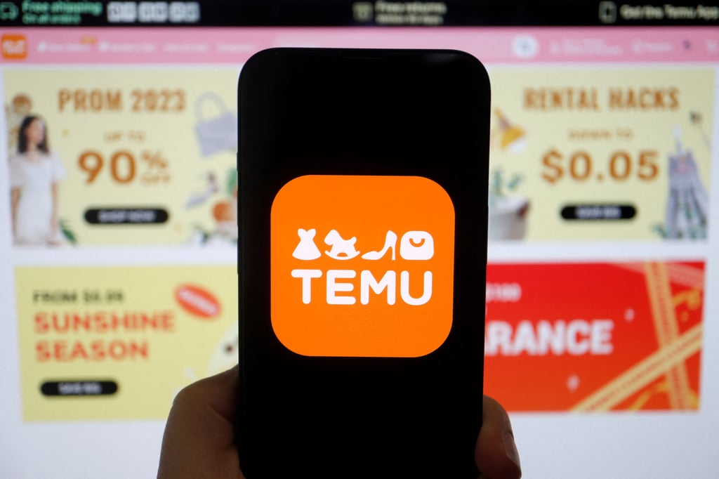 The logo of Temu, an e-commerce platform owned by PDD Holdings, is seen on a mobile phone displayed in front of its website, in this illustration picture taken April 26, 2023. Photo: Reuters