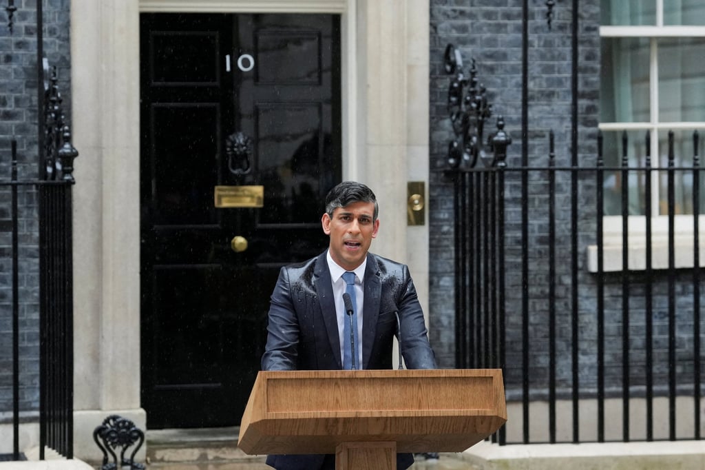 A rain-soaked British Prime Minister Rishi Sunak announcing the election on Wednesday. Photo: Reuters