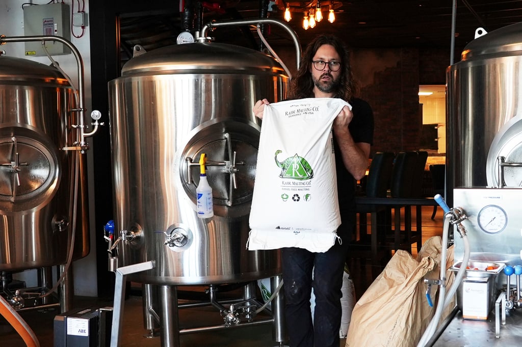 Mitchell Dougherty, Side Hustle Brews and Spirits’ master brewer, at Craft, the company’s Abu Dhabi brew pub. Photo: AP Mitchell Dougherty, Side Hustle Brews and Spirits’ master brewer, at Craft, the company’s Abu Dhabi brew pub. Photo: AP
