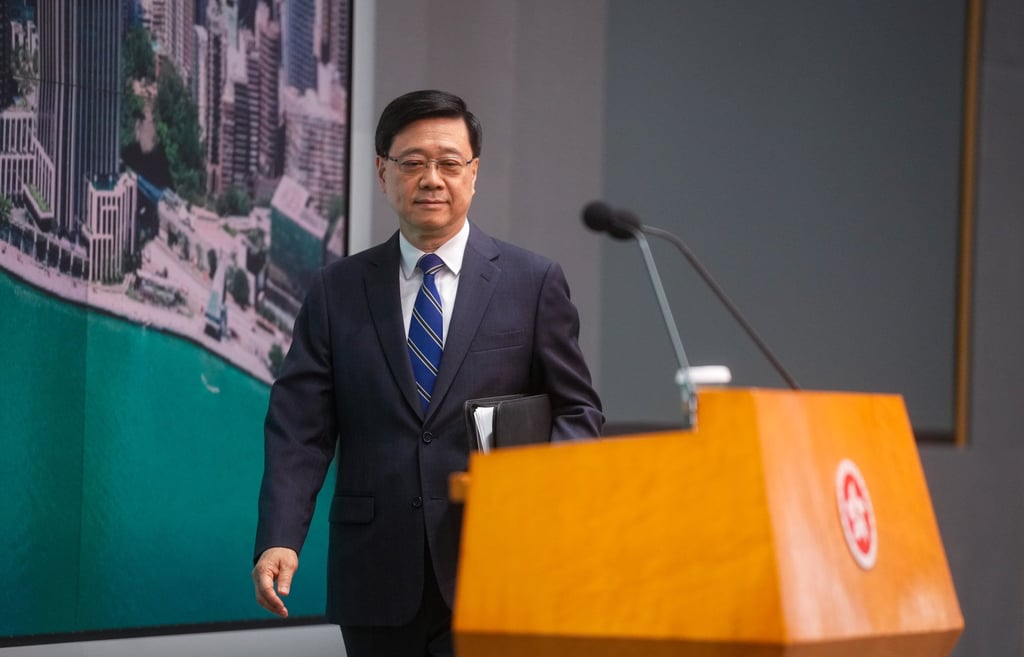 Chief Executive John Lee Ka-chiu has urged Hong Kong cabbies to stop launching “sting” operations against Uber drivers, warning such efforts require proper training and legal knowledge. Photo: Elson Li