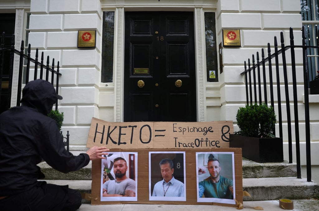 Images of Peter Wai (left), Bill Yuen (centre) and Matthew Trickett (right) were placed outside the Hong Kong Economic and Trade Office in London. Photo: Reuters Images of Peter Wai (left), Bill Yuen (centre) and Matthew Trickett (right) were placed outside the Hong Kong Economic and Trade Office in London. Photo: Reuters