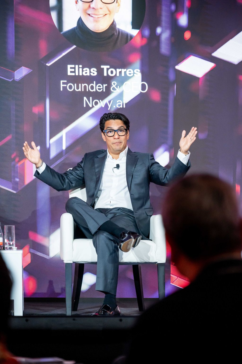 Entrepreneur Elias Torres, founder and CEO of Novy.ai, speaks during the “All-in on Innovation” event about how his company uses AI to help its clients increase productivity.