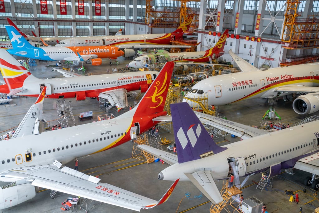 Aeroplanes undergo maintenance at a hangar in Haikou, in China’s Hainan Province. Passenger planes that fly millions of kilometres across the world each day are arguably the safest form of transport. But this can lull people into a false sense of security. Photo: Getty Images