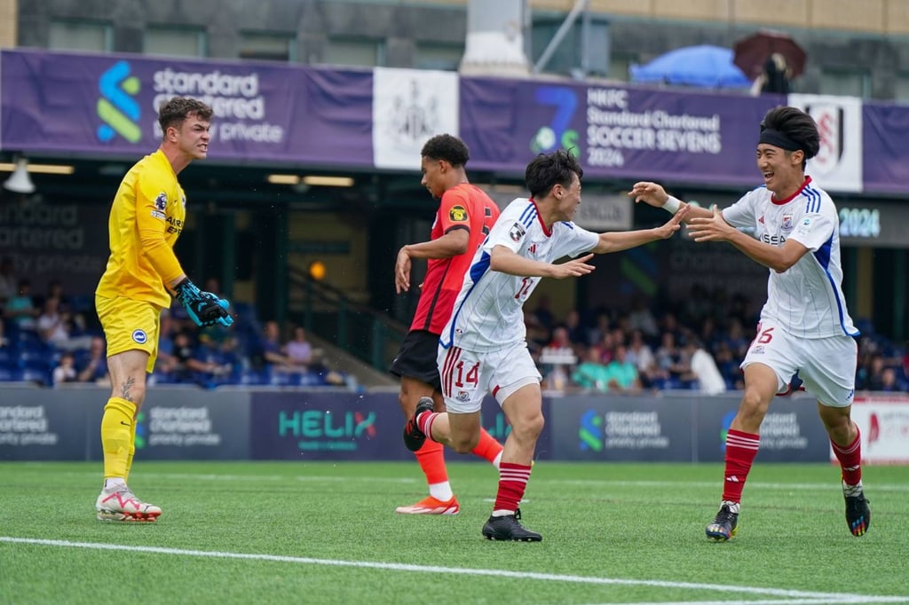 Yokohamas F. Marinos celebrate their opening goal against Brighton. Photo: HKFC Standard Chartered Soccer Sevens Yokohamas F. Marinos celebrate their opening goal against Brighton. Photo: HKFC Standard Chartered Soccer Sevens