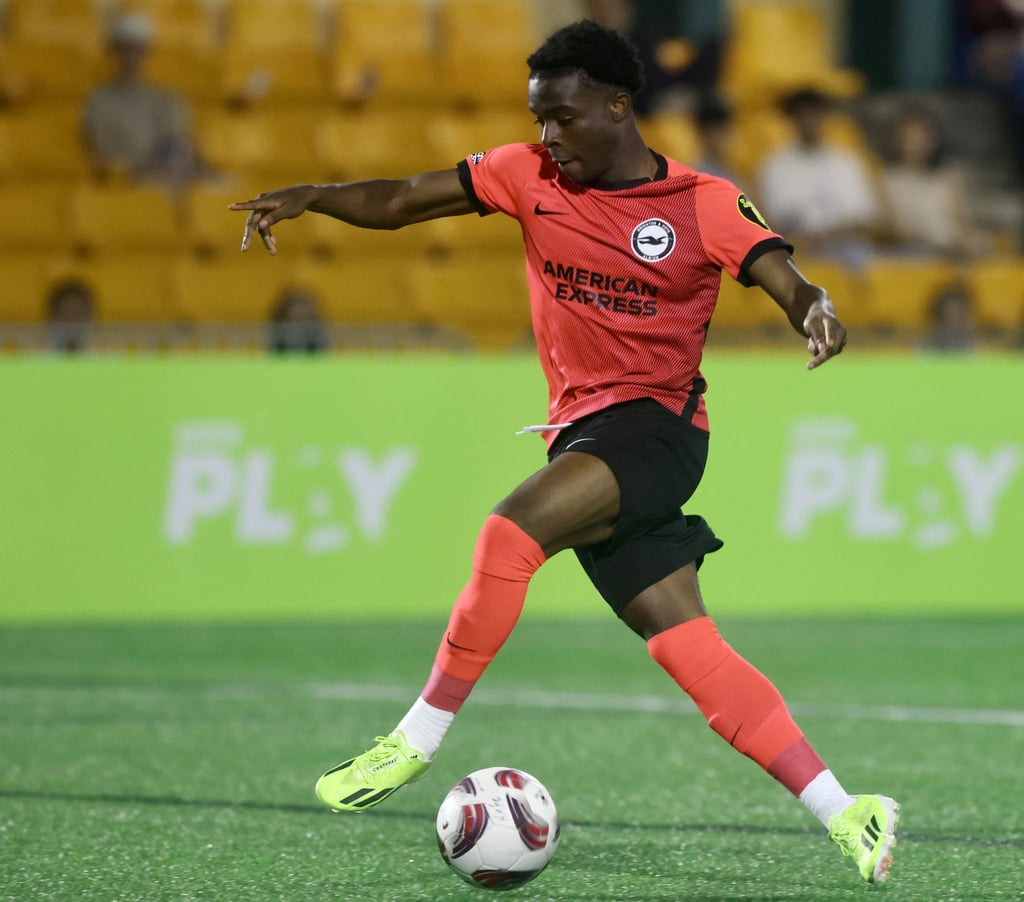 Brighton’s Benicio Baker-Boaitey prepares to slide the ball into the goal for his side’s second against Aston Villa. Photo: Jonathan Wong Brighton’s Benicio Baker-Boaitey prepares to slide the ball into the goal for his side’s second against Aston Villa. Photo: Jonathan Wong