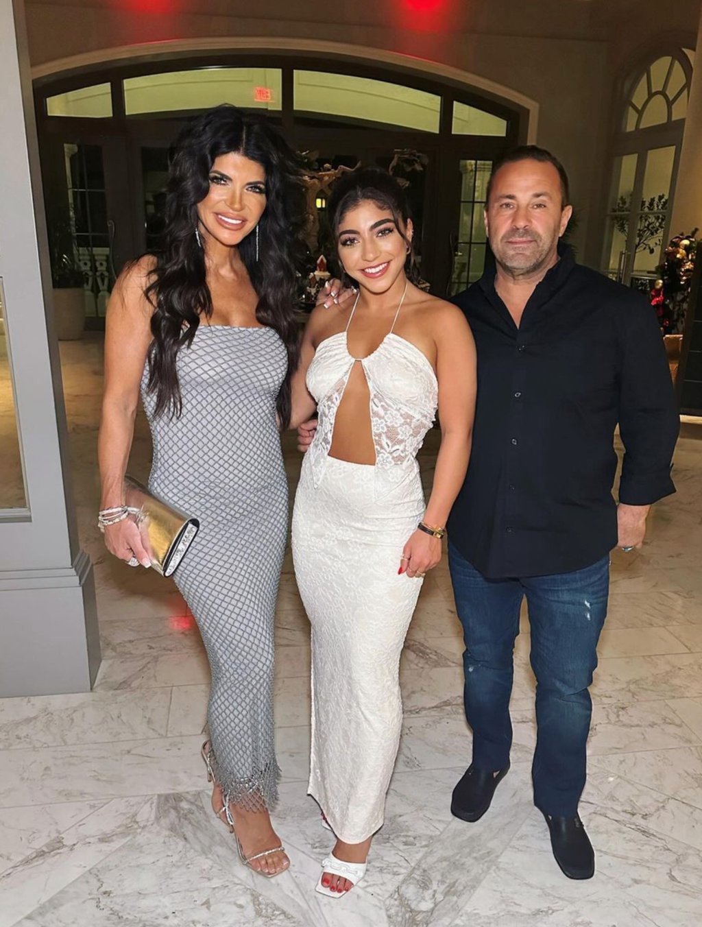 Milania Giudice with her parents, reality TV star Teresa Giudice and Joe Giudice. Photo: @milania.ggiudice/Instagram Milania Giudice with her parents, reality TV star Teresa Giudice and Joe Giudice. Photo: @milania.ggiudice/Instagram
