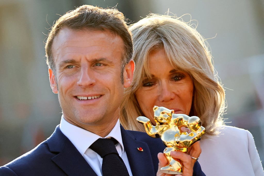 French President Emmanuel Macron and his wife Brigitte Macron in Berlin, Germany. Photo: Reuters