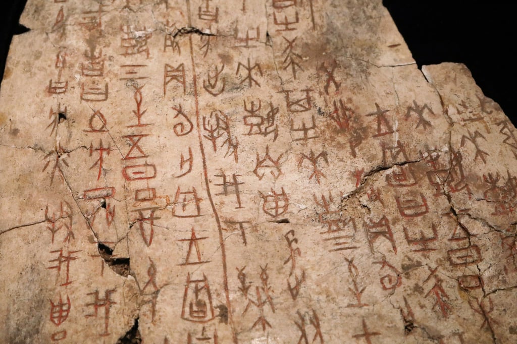 An oracle bone, with inscriptions painted in red. Photo: Simon Song An oracle bone, with inscriptions painted in red. Photo: Simon Song