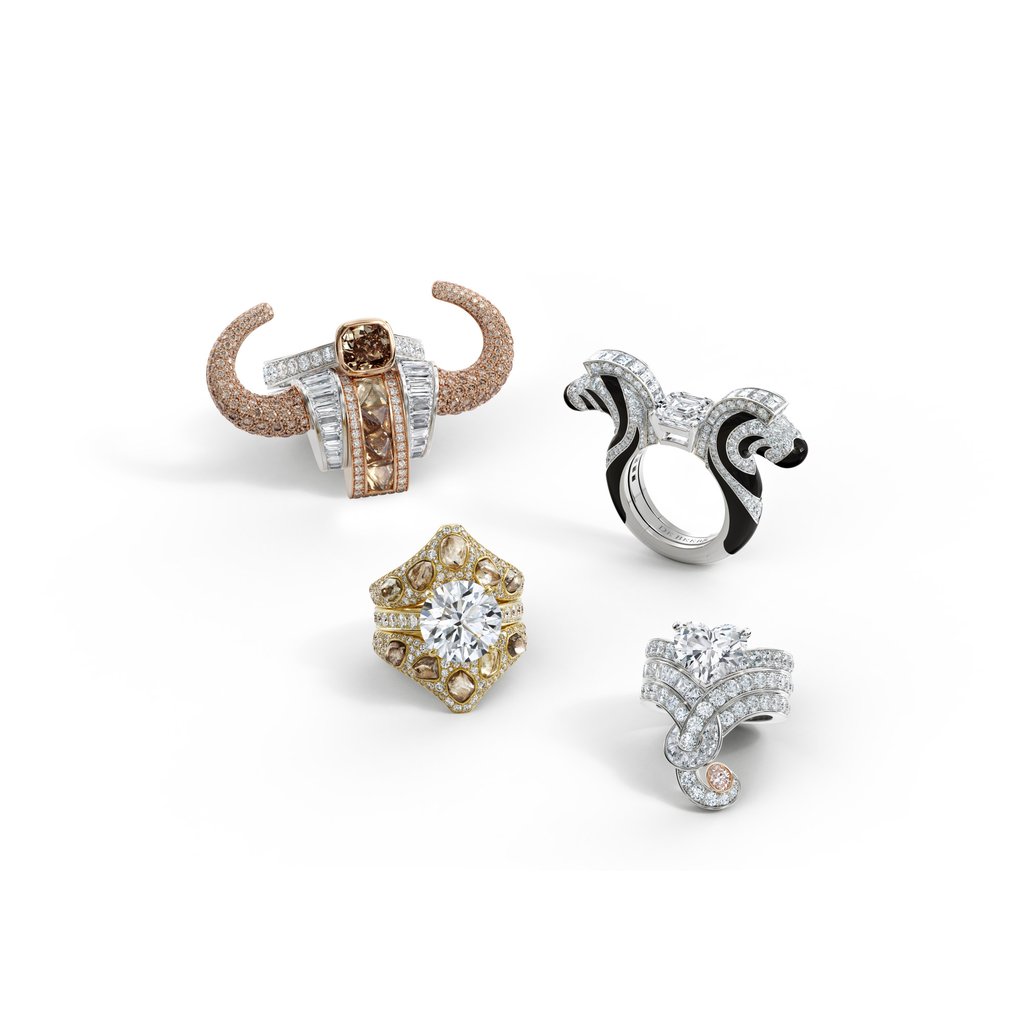 Clockwise from top left, De Beers Forces of Nature Buffalo Crown ring, Zebra Jacket ring, Elephant Crown ring and Giraffe Crown ring Clockwise from top left, De Beers Forces of Nature Buffalo Crown ring, Zebra Jacket ring, Elephant Crown ring and Giraffe Crown ring