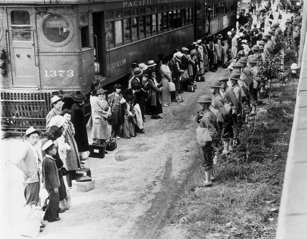 American troops supervise the movement of Japanese-Americans from their homes to camps during World War II. Photo: Getty Images American troops supervise the movement of Japanese-Americans from their homes to camps during World War II. Photo: Getty Images