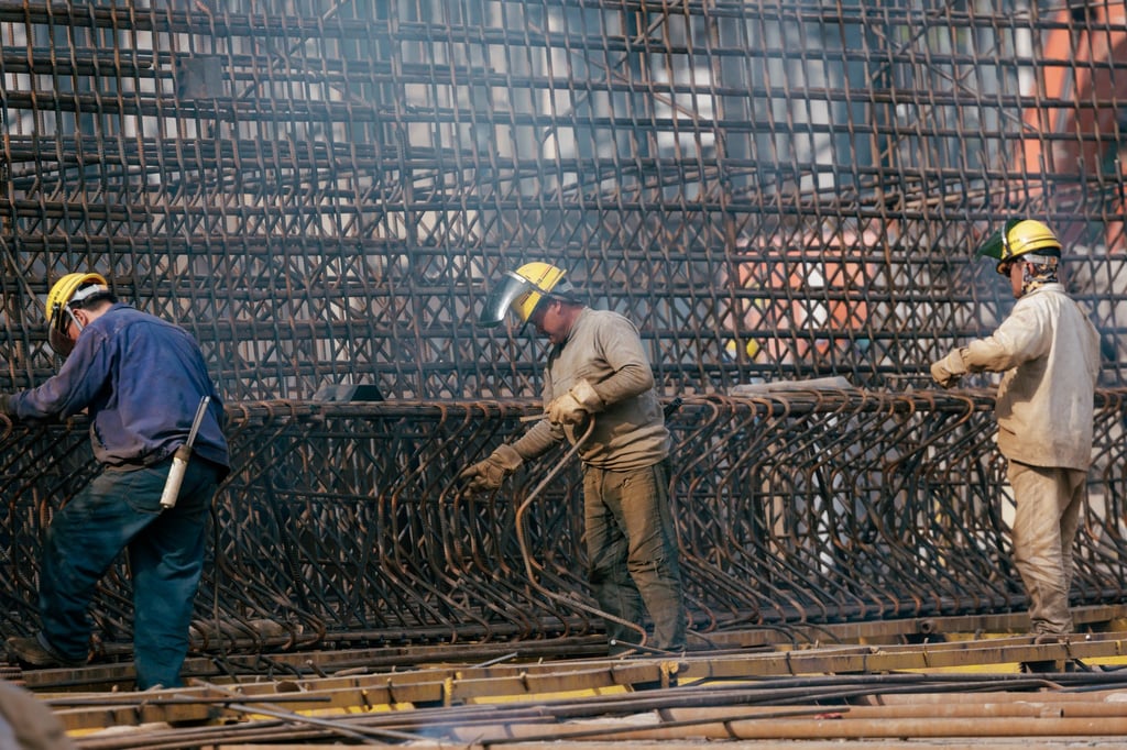 Labourers work at a construction site in Shanghai, China, 15 April 2024. Photo: EPA-EFE Labourers work at a construction site in Shanghai, China, 15 April 2024. Photo: EPA-EFE
