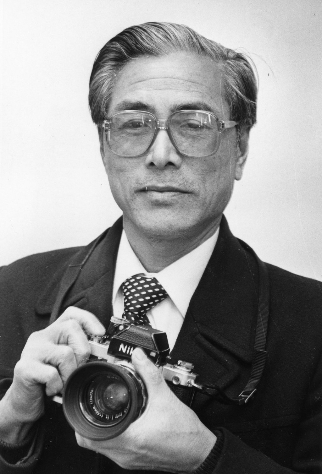 South China Morning Post star photographer Chan Kiu in the 1980s. An exhibition of striking images captured by his camera is on at the Hong Kong News-Expo. Photo: SCMP South China Morning Post star photographer Chan Kiu in the 1980s. An exhibition of striking images captured by his camera is on at the Hong Kong News-Expo. Photo: SCMP