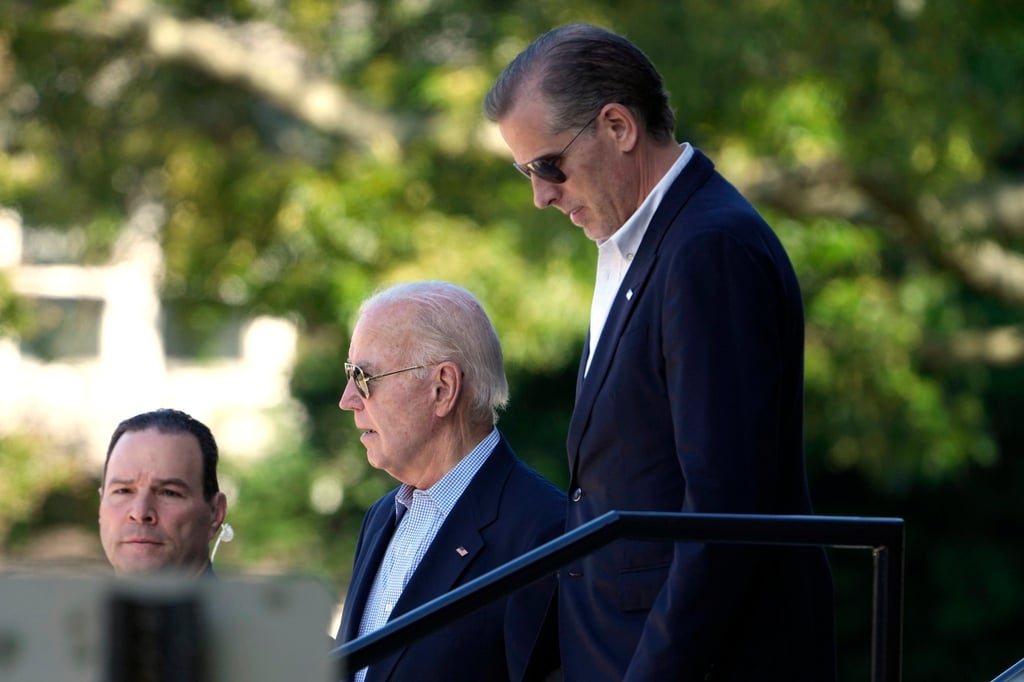 US President Joe Biden and his son Hunter Biden leaving church on Saturday. Photo: AP US President Joe Biden and his son Hunter Biden leaving church on Saturday. Photo: AP